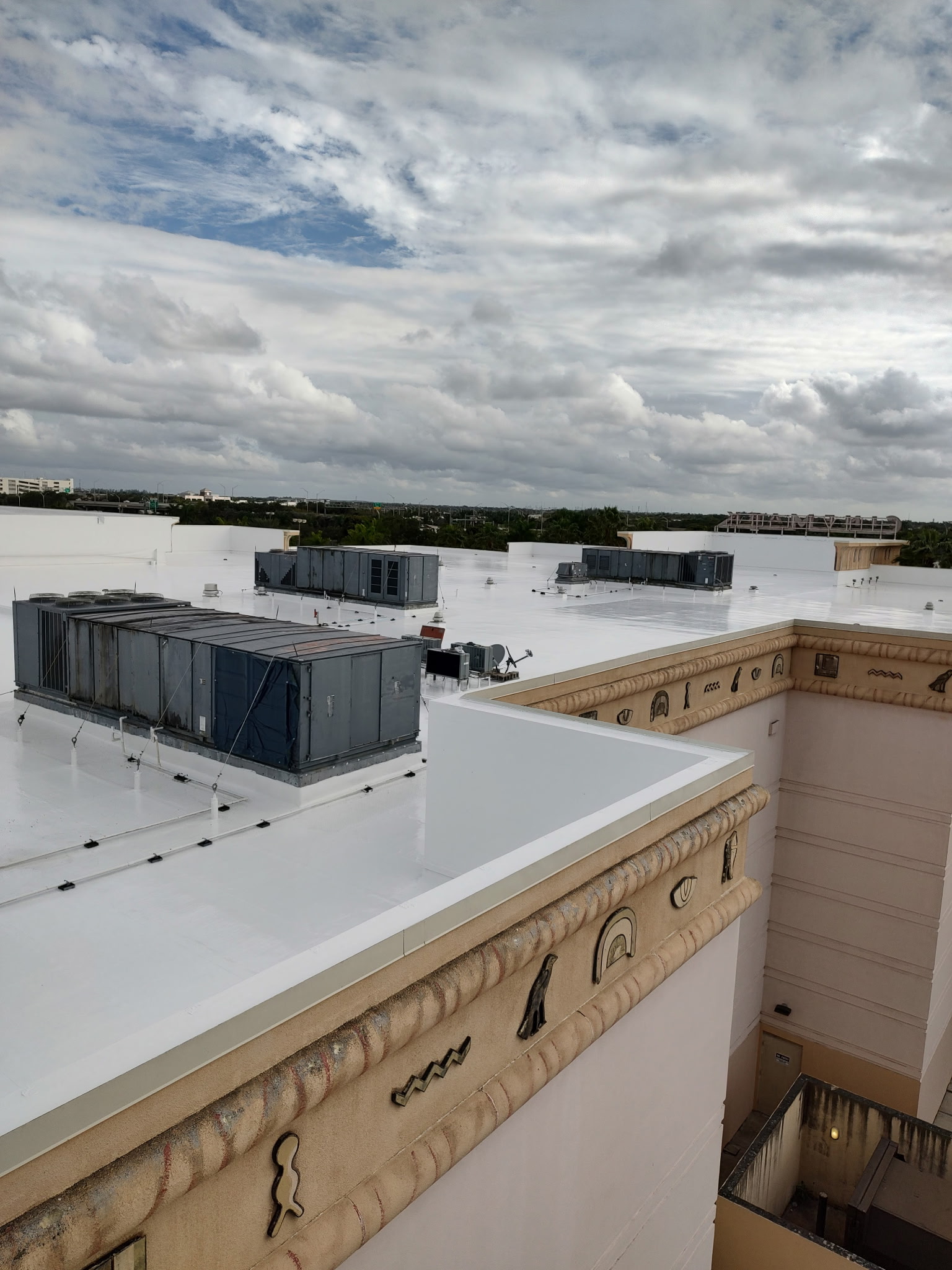 Metal roof coating installation